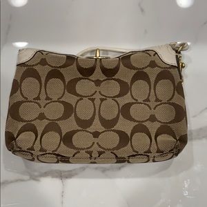 Coach signature wristlet.